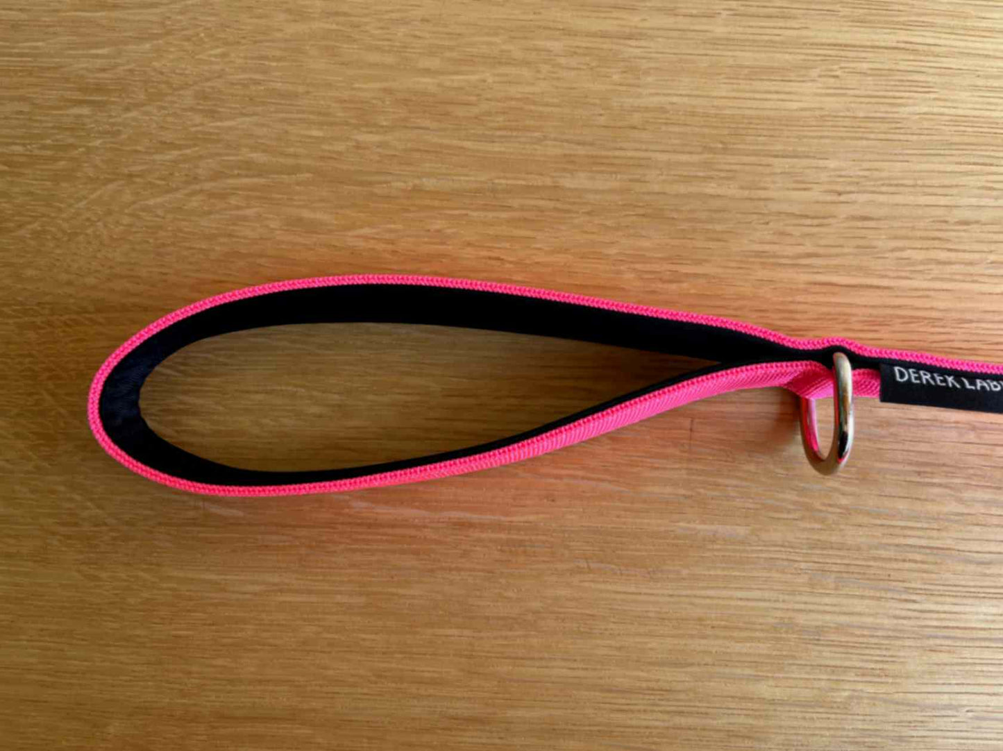 Handle of pink dog leash