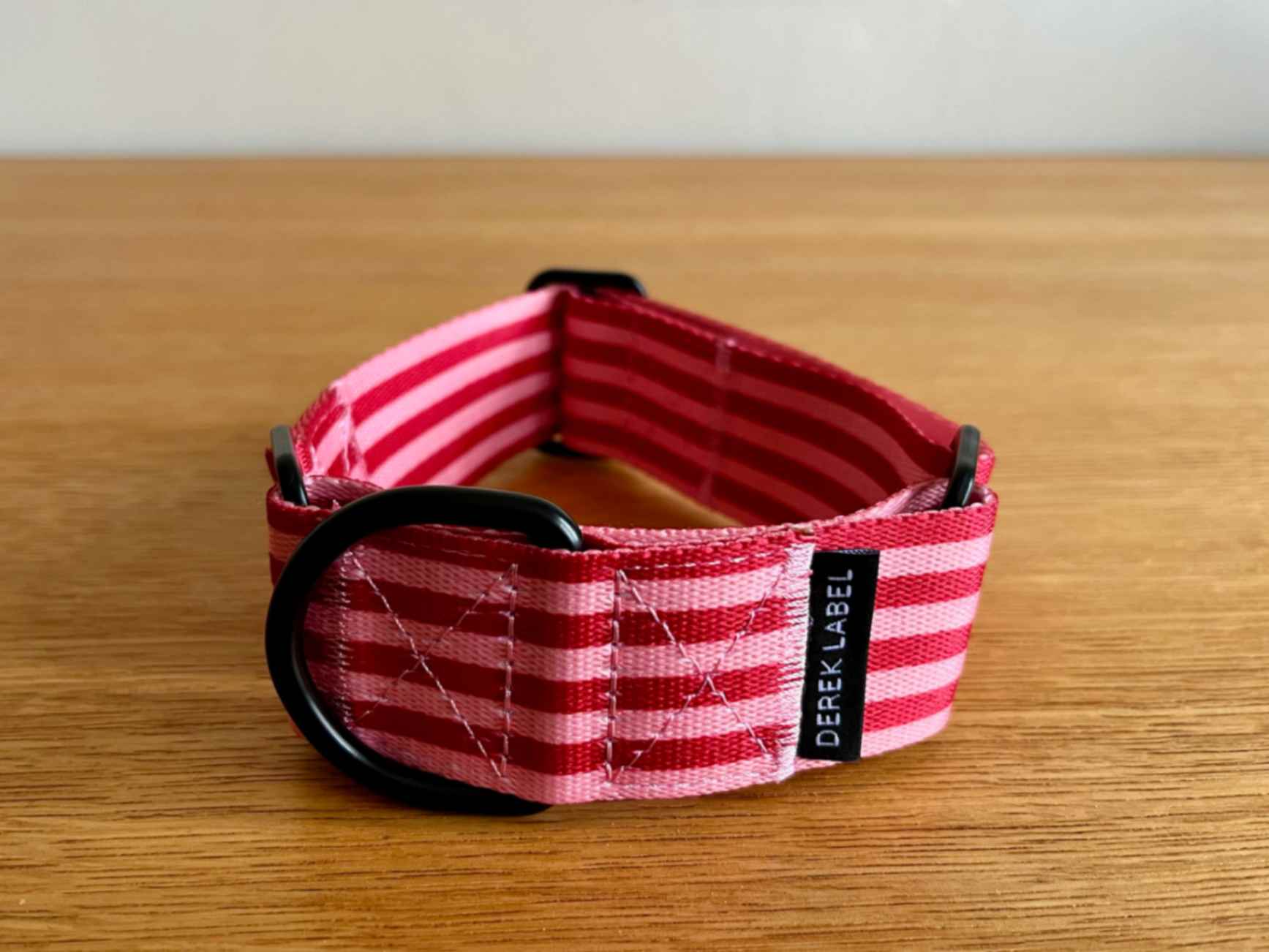 pink and red striped martingale collar